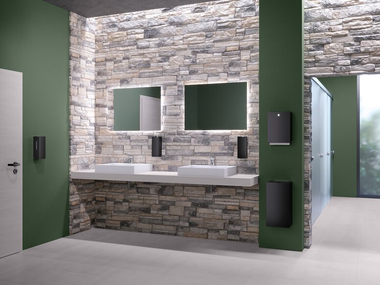 Public WC equipped with soap, disinfectant and paper towel dispensers in the colour black matt
